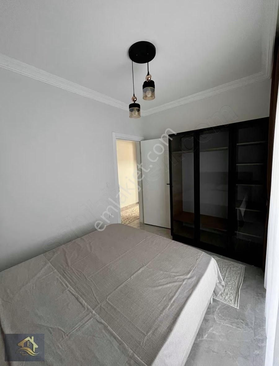 Kuşadası'nda Havuzlu Full Sıfır Eşyalı Satılık 1+1 Bahçeli Daire - Görsel 14