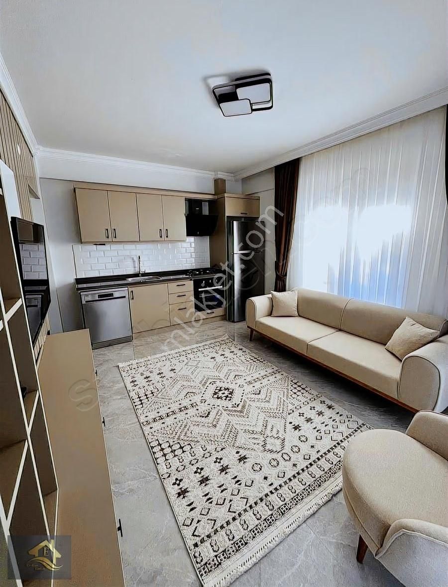 Kuşadası'nda Havuzlu Full Sıfır Eşyalı Satılık 1+1 Bahçeli Daire - Görsel 7