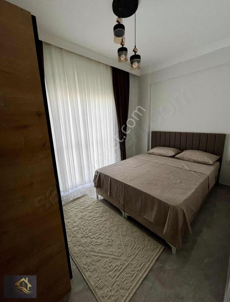 Kuşadası'nda Havuzlu Full Sıfır Eşyalı Satılık 1+1 Bahçeli Daire - Görsel 10