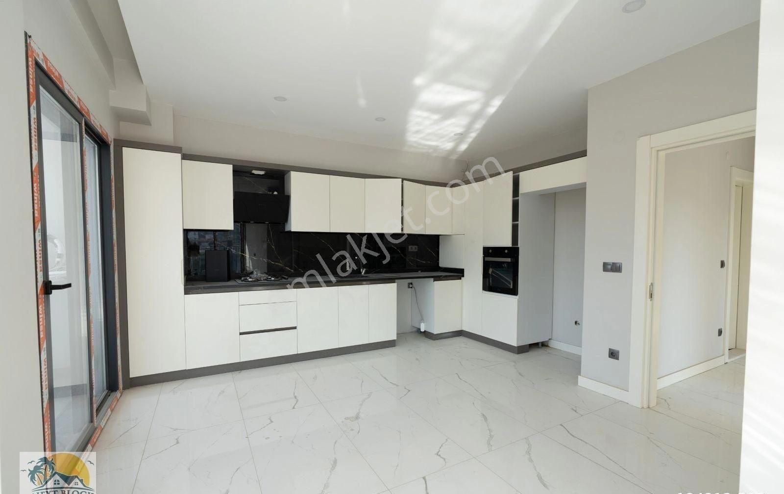 Kuşadası Değirmendere'de Merkezi Konumda Satılık Sıfır 3+1 Daire - Görsel 12