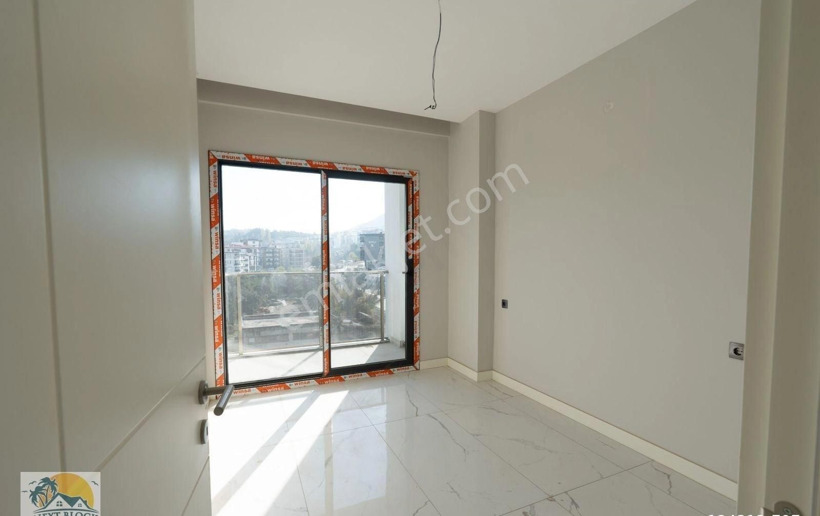 Kuşadası Değirmendere'de Merkezi Konumda Satılık Sıfır 3+1 Daire - Görsel 29