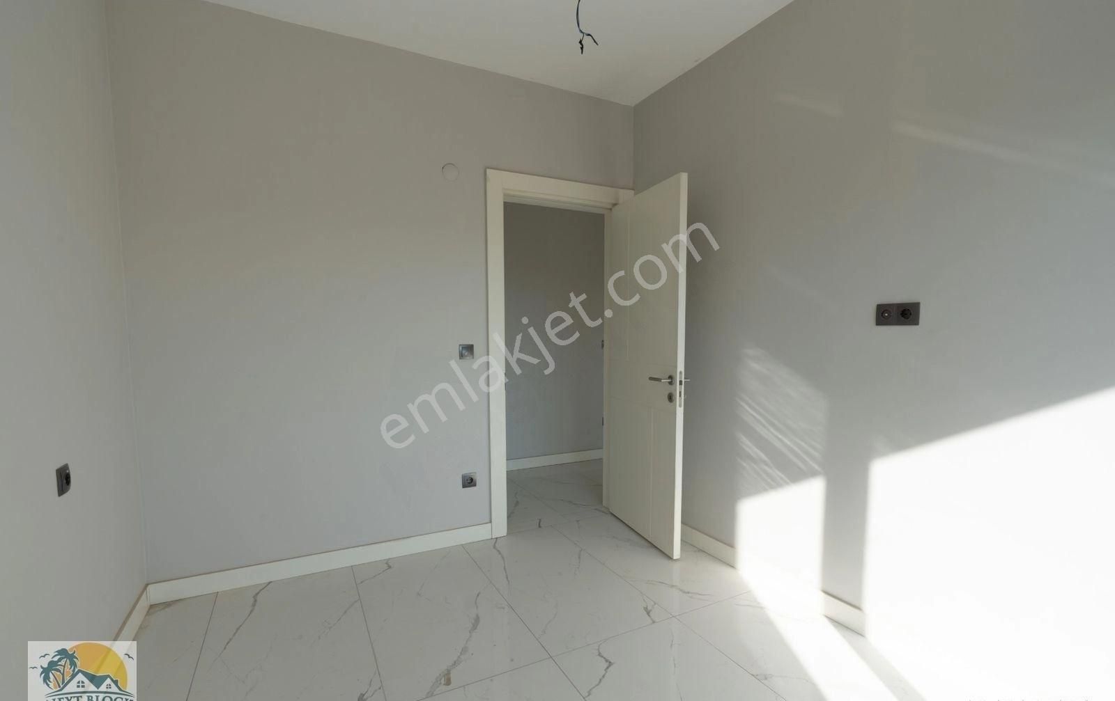 Kuşadası Değirmendere'de Merkezi Konumda Satılık Sıfır 3+1 Daire - Görsel 21