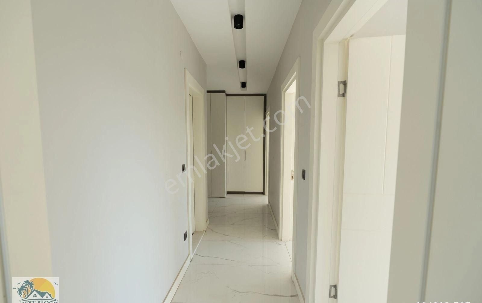 Kuşadası Değirmendere'de Merkezi Konumda Satılık Sıfır 3+1 Daire - Görsel 20