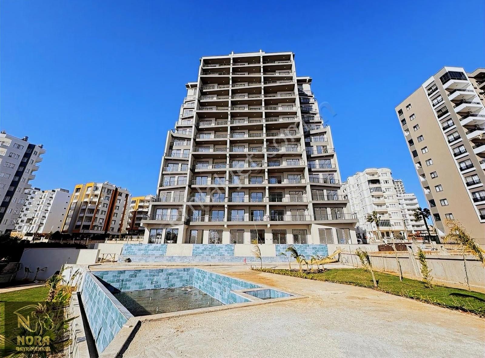 Nora'dan Site İçi Deniz Manzaralı 3 Cepheli Geniş 1+1 Satılık