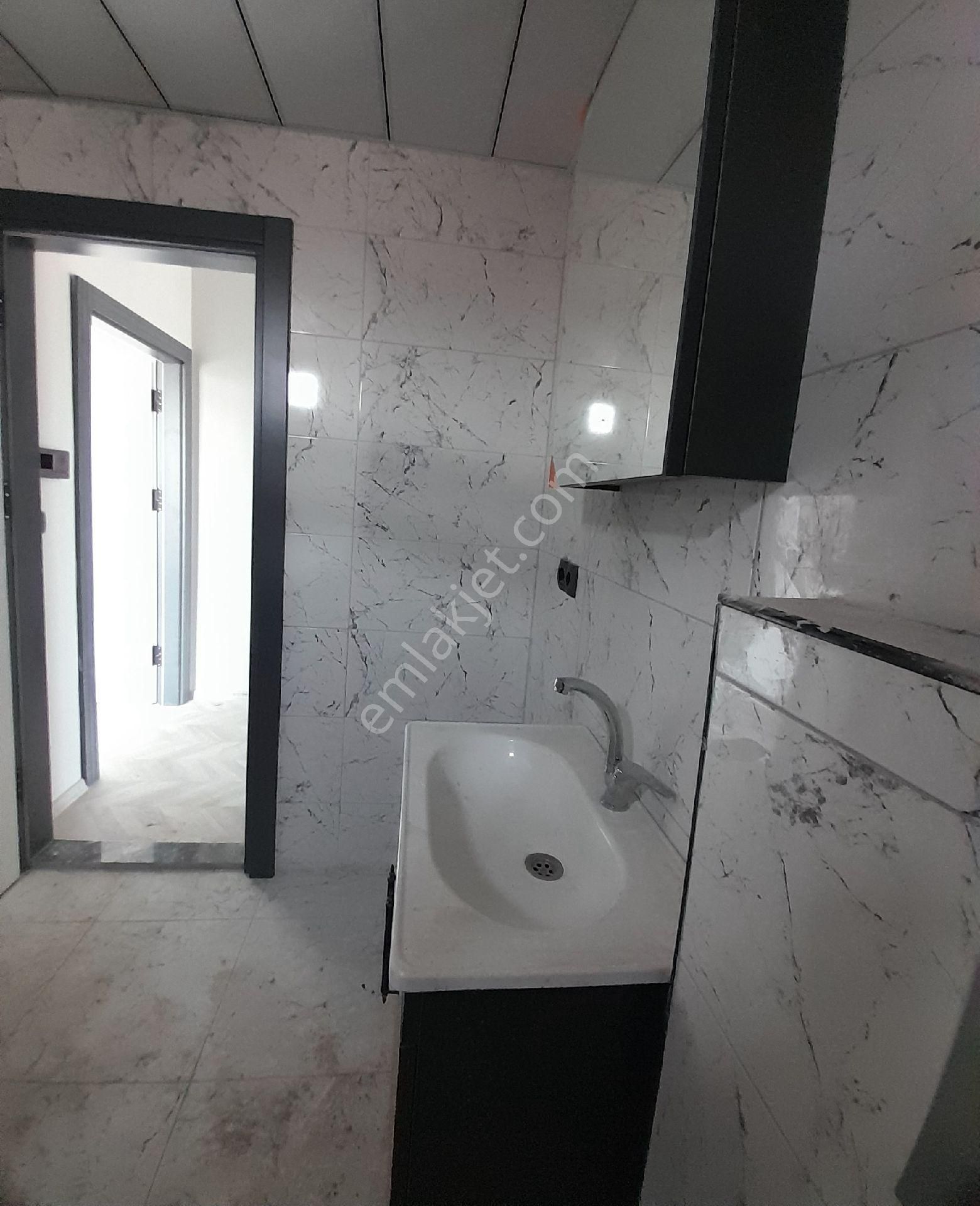 Körfez'de Satılık 1+1 Daire - Görsel 13