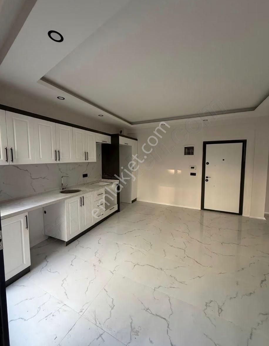 Kuşadası Ege Mahallesinde Yerden Isıtmalı Satılık Sıfır 1+1 - Görsel 11