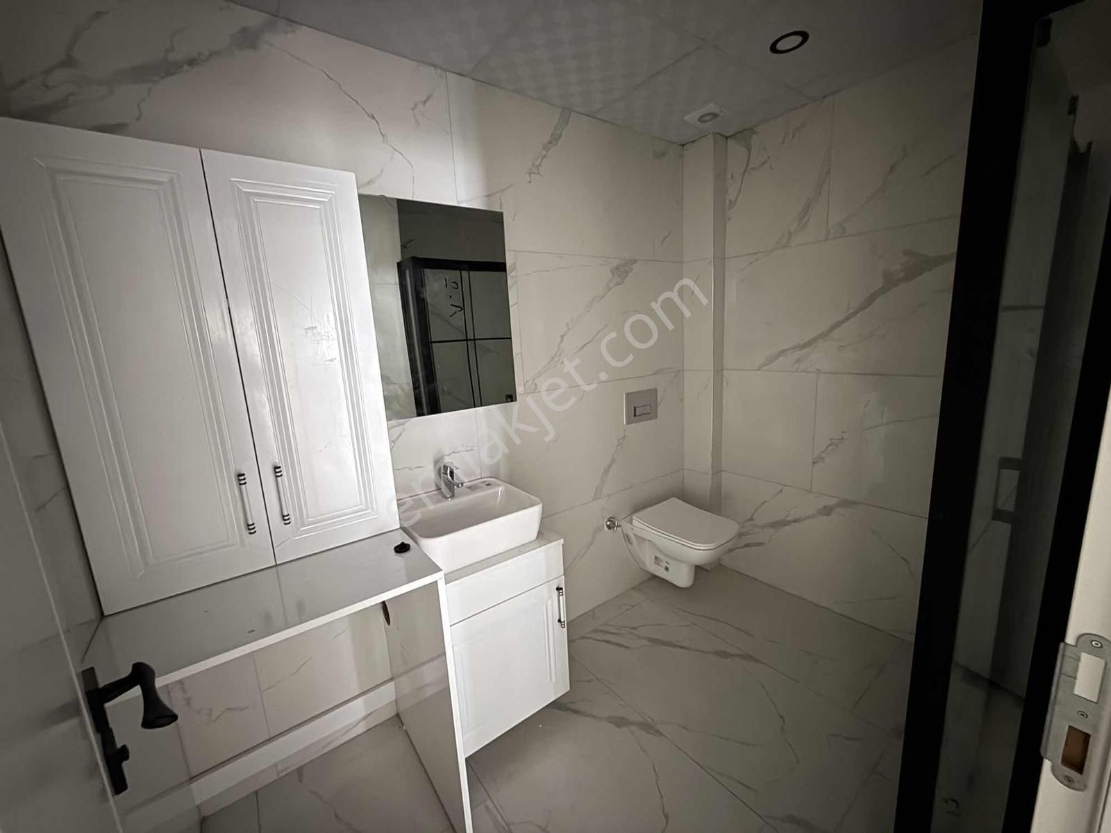 Kuşadası Davutlar Merkezde Satılık 2+1 Arakat Daire - Görsel 32