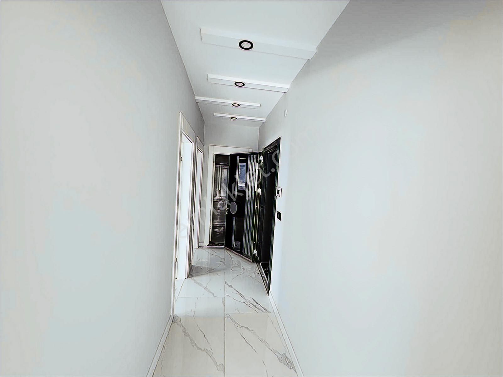 Kuşadası Davutlar Merkezde Satılık 2+1 Arakat Daire - Görsel 15