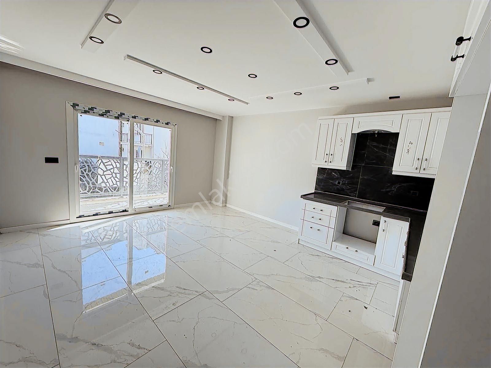 Kuşadası Davutlar Merkezde Satılık 2+1 Arakat Daire - Görsel 24