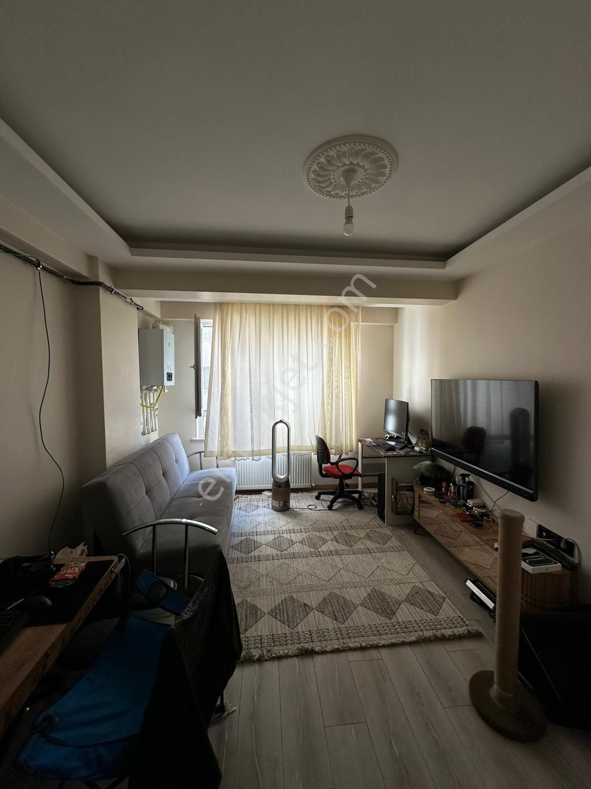 Sütlüce Mahallesinde Satılık Kiracılı 1+1 Daire