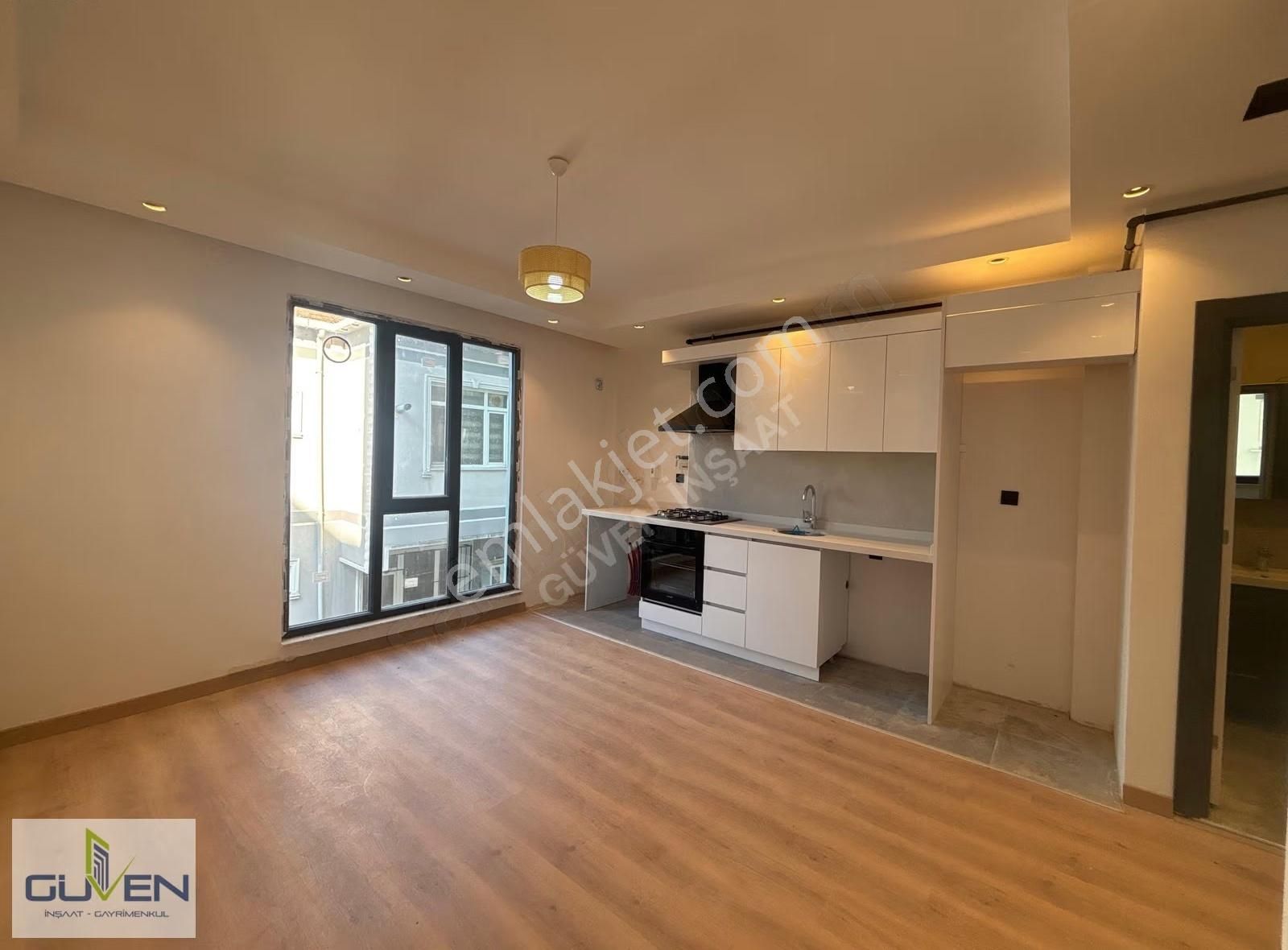 Güven'den Merkezi Konumda İskanlı Ön Cephe K.otoparklı 1+1 Daire - Görsel 11