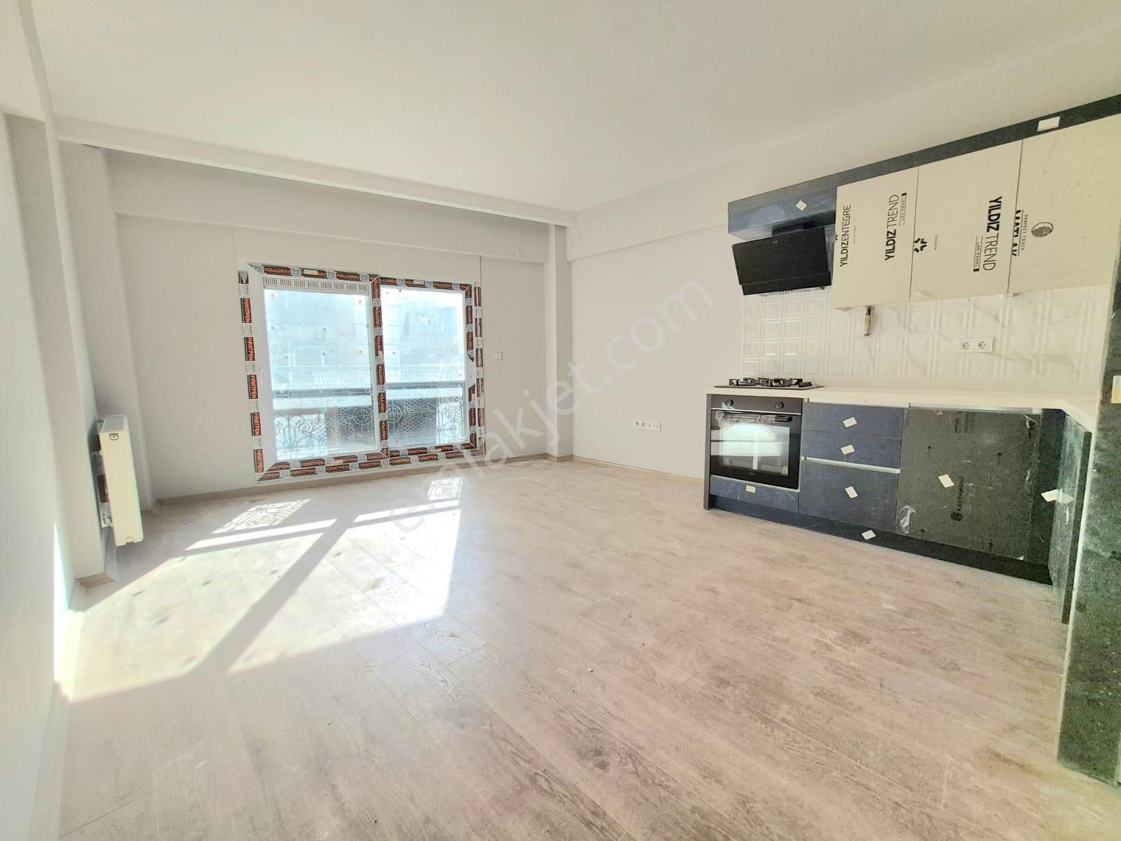 Alaybey Merkezde Yeni Bina Kapalı Otopark 1+1 65m2