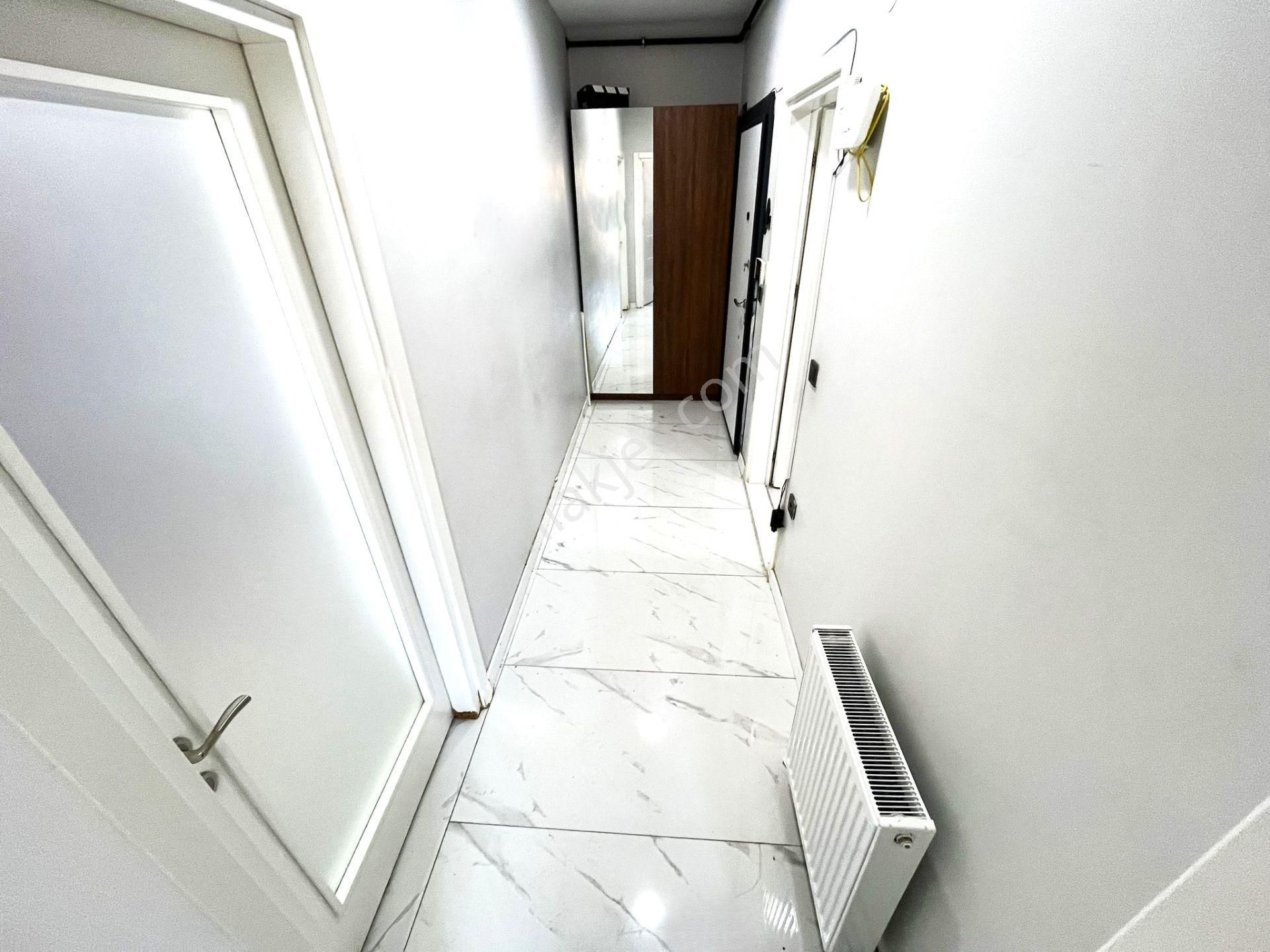 Edremit Gümrük Merkez'de Aygül'den Doğalgaz Kombili Asansörlü Sığınaklı Yatırımlık 1+1 Satılık Daire - Görsel 24