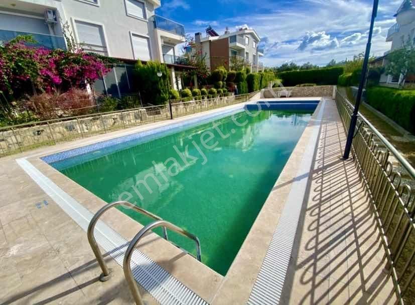 Kuşadası'nda Muhteşem Konumda 5+2 Yatırımlık Tripleks Villa