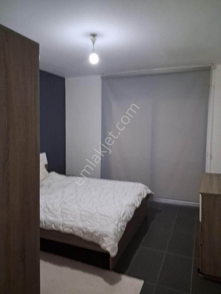 Kuşadasında Havuzlu Güvenlikli Bahçe Katı Eşyalı 2+1 - Görsel 15