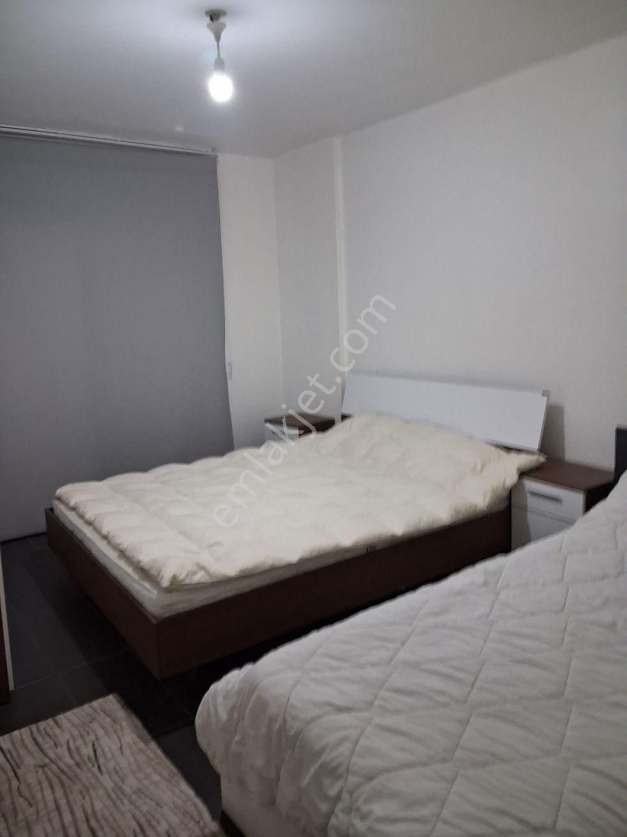 Kuşadasında Havuzlu Güvenlikli Bahçe Katı Eşyalı 2+1 - Görsel 10