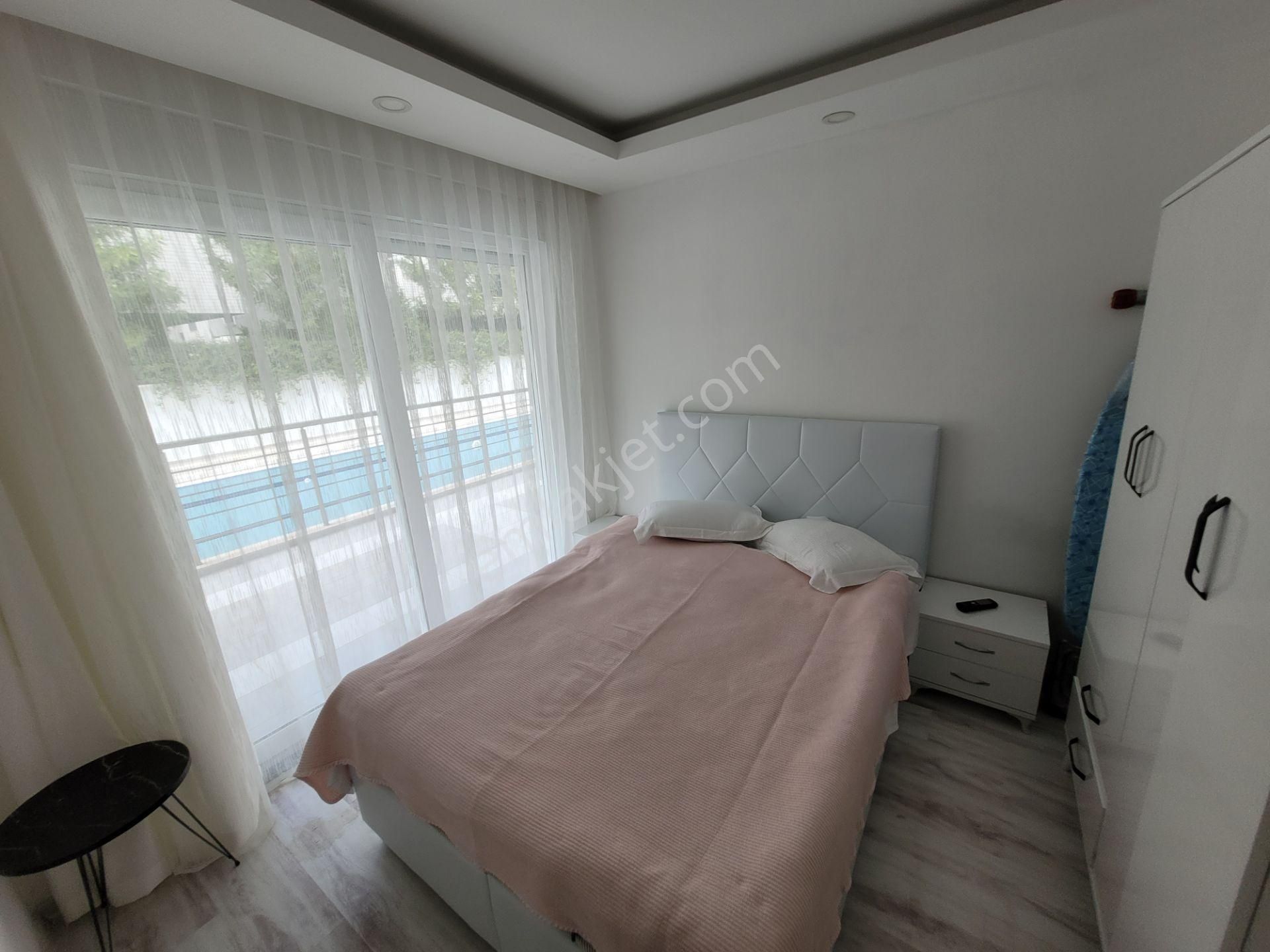 Güzeloba'da Artuklu Konutlarında 1+1 Yatırımlık Giriş Katı - Görsel 11