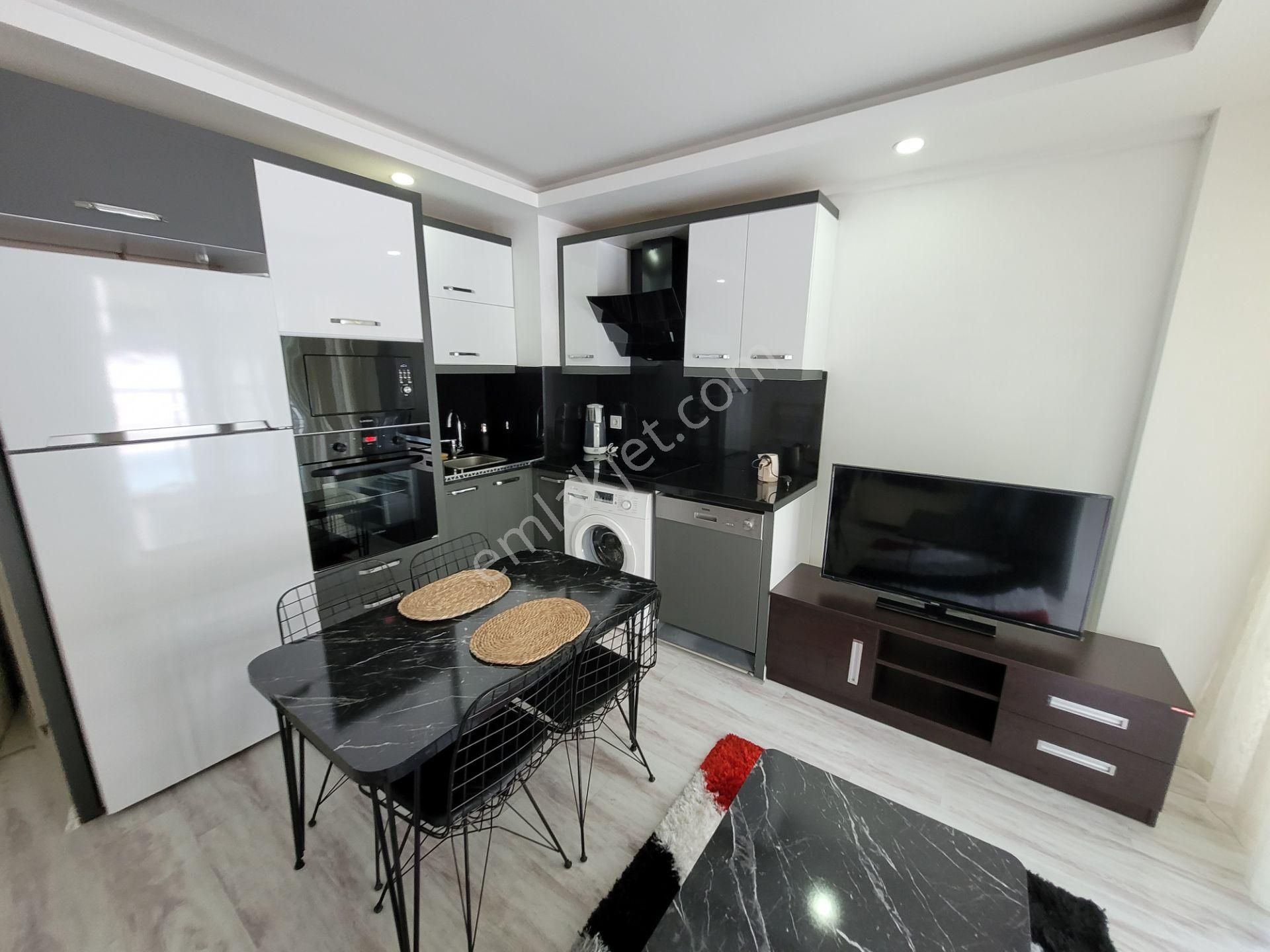 Güzeloba'da Artuklu Konutlarında 1+1 Yatırımlık Giriş Katı - Görsel 9