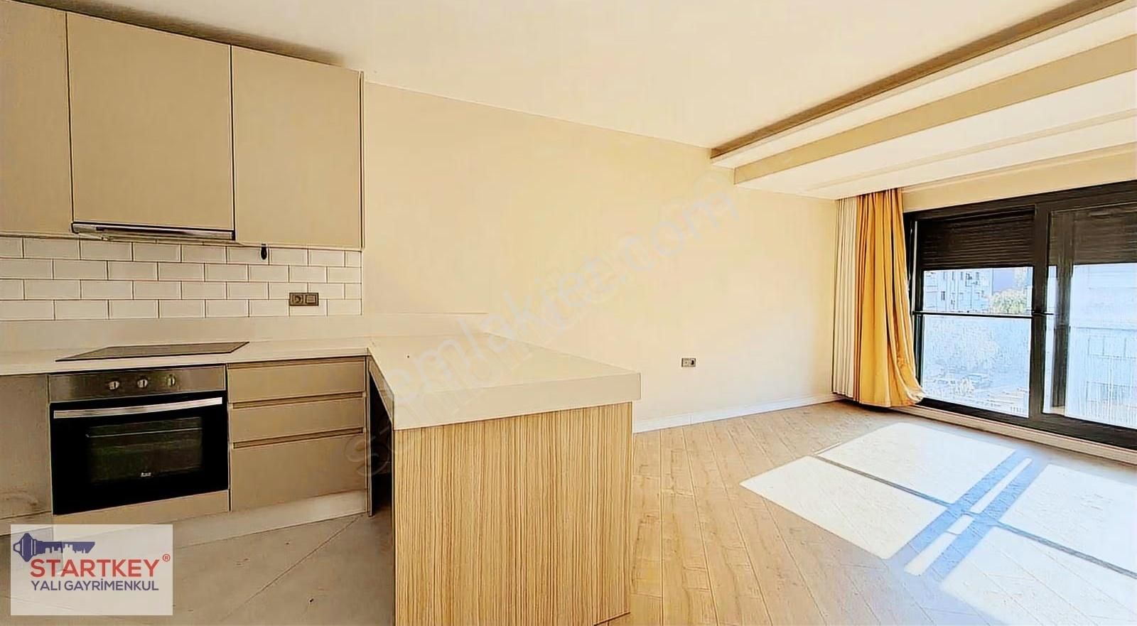 Bostanlı Şehitler Bulvarı'nda Ara Kat Kiralık 1+1 Daire - Görsel 34