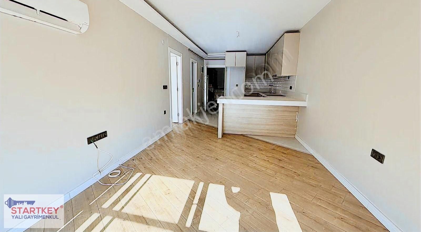 Bostanlı Şehitler Bulvarı'nda Ara Kat Kiralık 1+1 Daire - Görsel 24