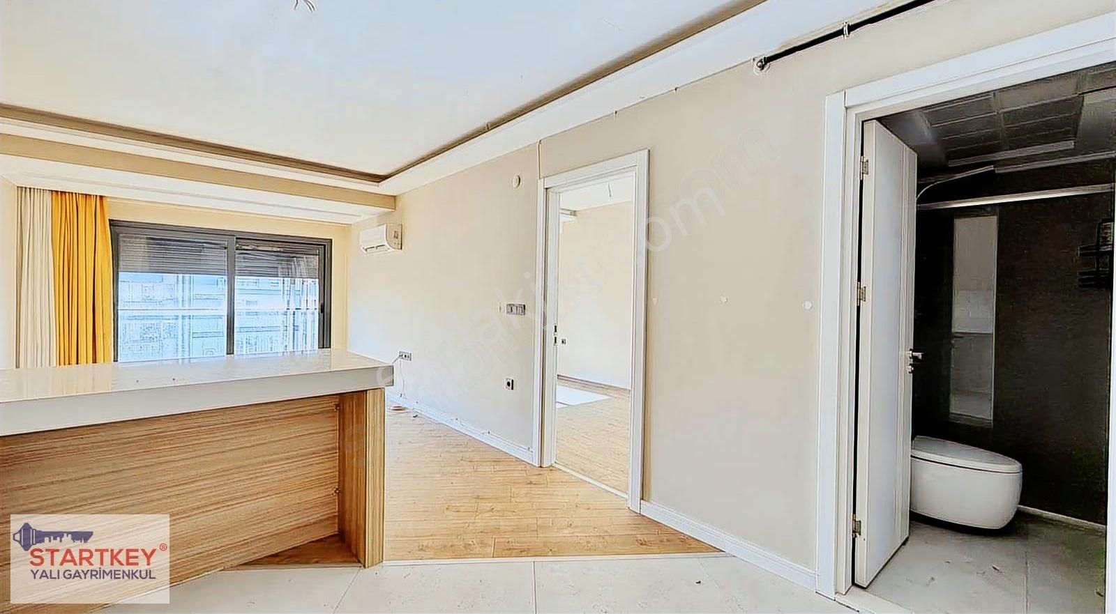 Bostanlı Şehitler Bulvarı'nda Ara Kat Kiralık 1+1 Daire - Görsel 23