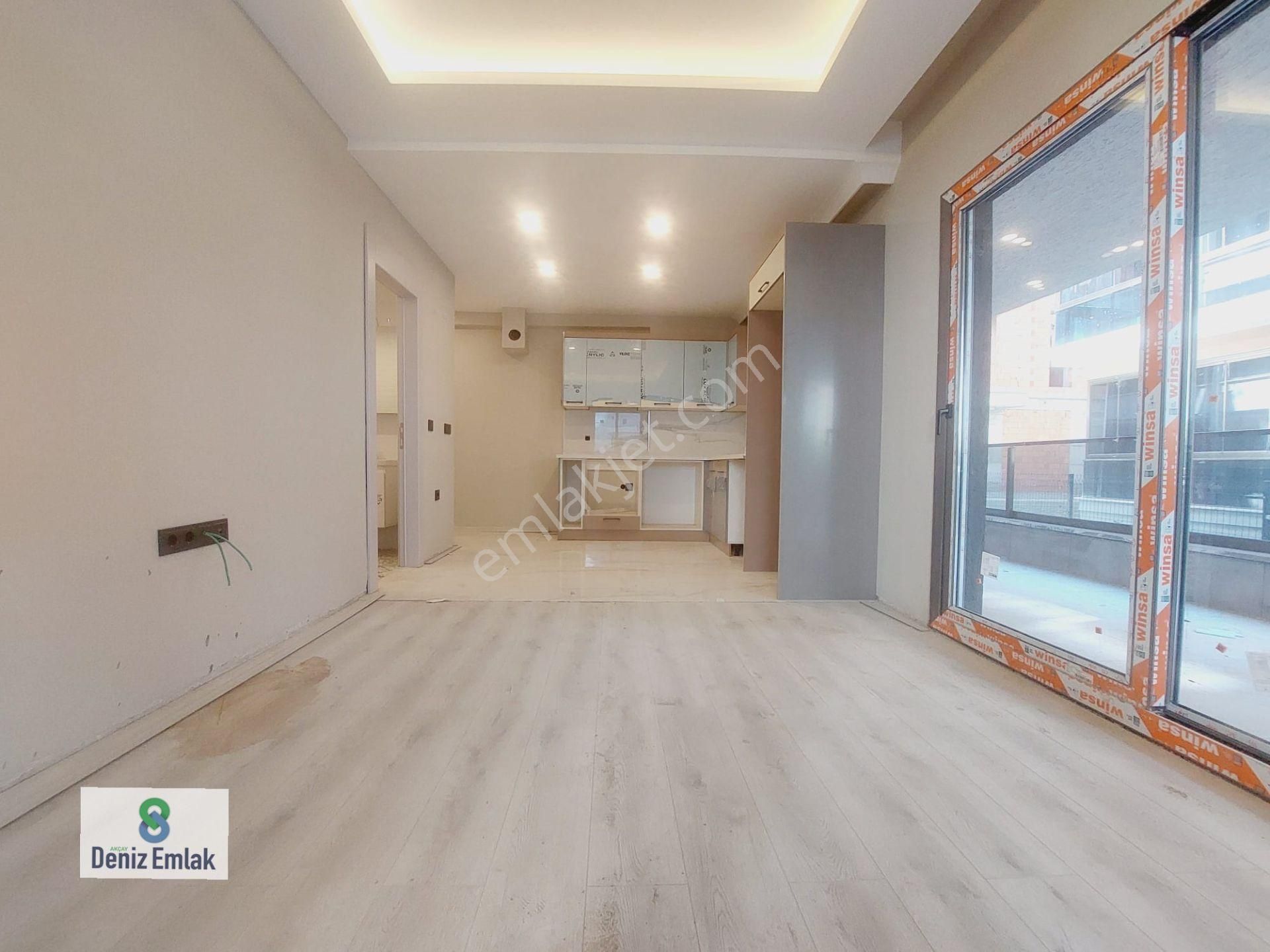 Denizden Akçayda Full Kredili Yerden Isıtmalı Satılık 1+1 Daire.