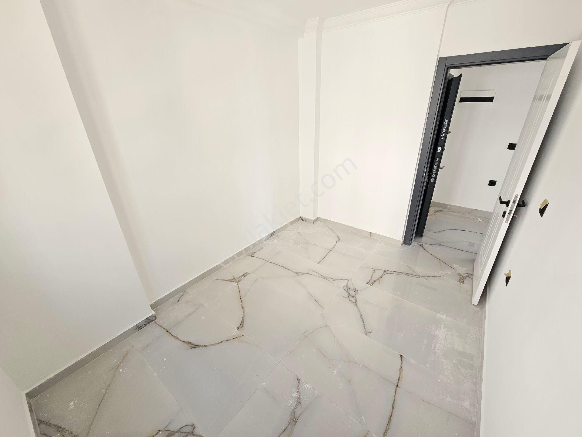 Didim'de Merkezi Konumda Satılık Sıfır 2+1 Daire - Görsel 9