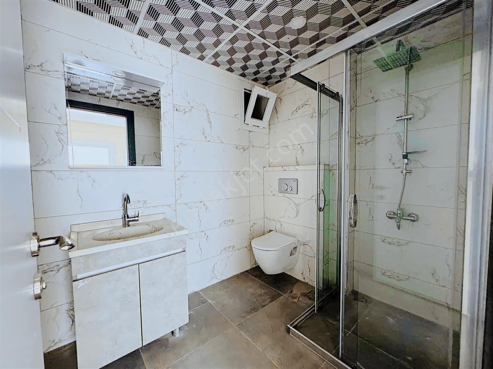 Davutlar'da Ebeveyn Banyolu Ayrı Mutfaklı Kiralık 2+1 Daire - Görsel 21