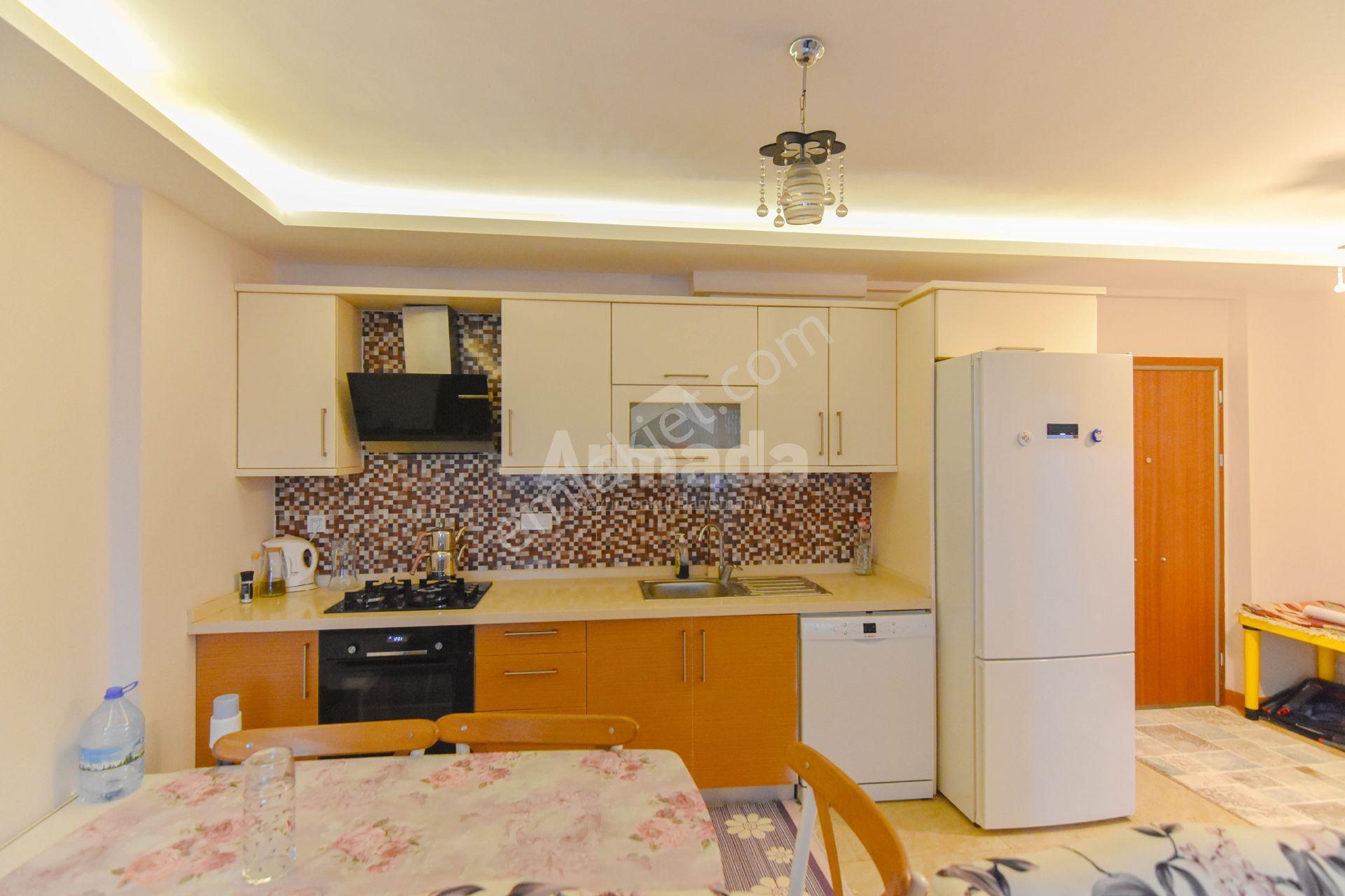 Kuşadası Değirmendere'de Havuzlu Sitede Bahçe Katı 2+1 Daire - Görsel 6