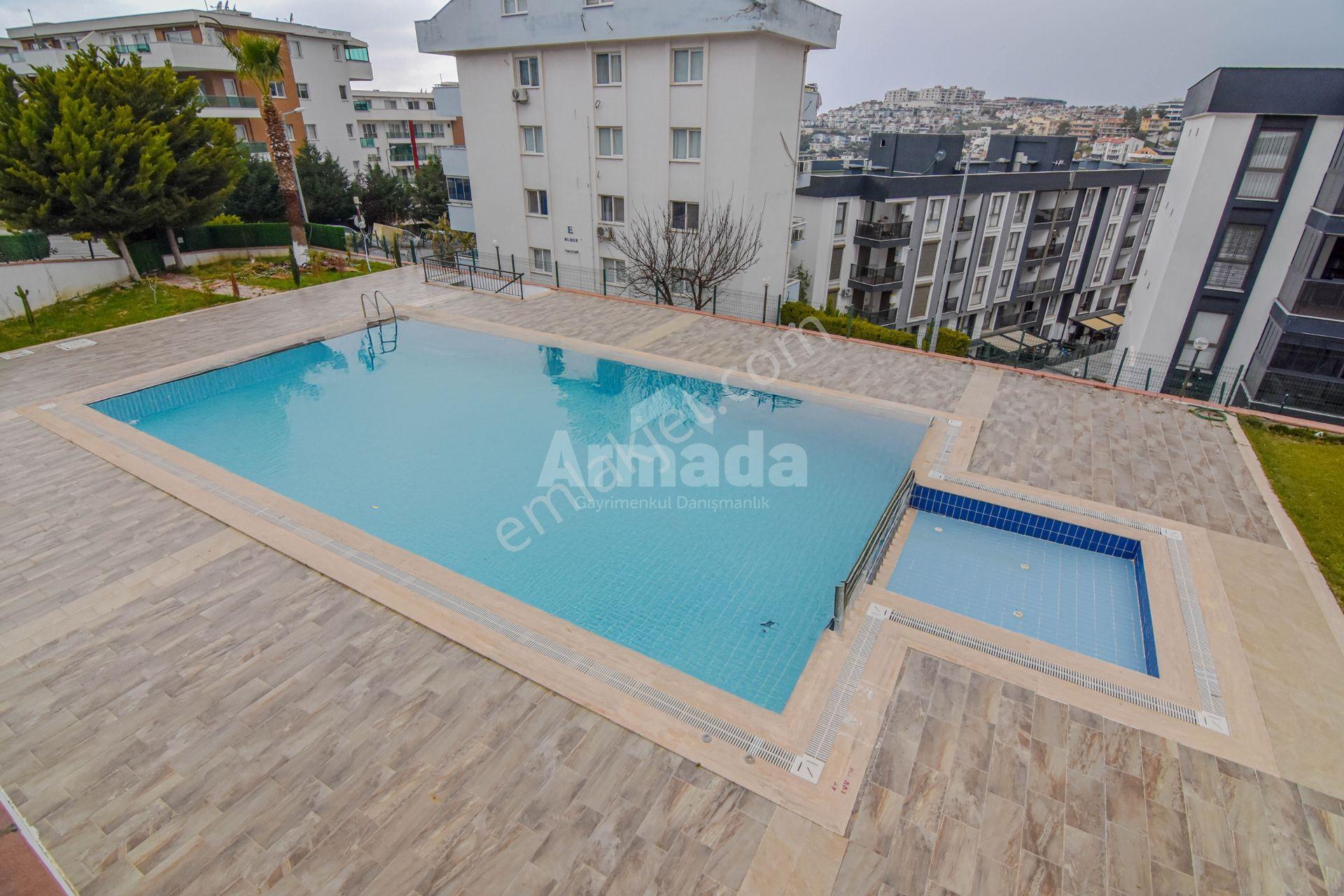 Kuşadası Değirmendere'de Havuzlu Sitede Bahçe Katı 2+1 Daire - Görsel 22