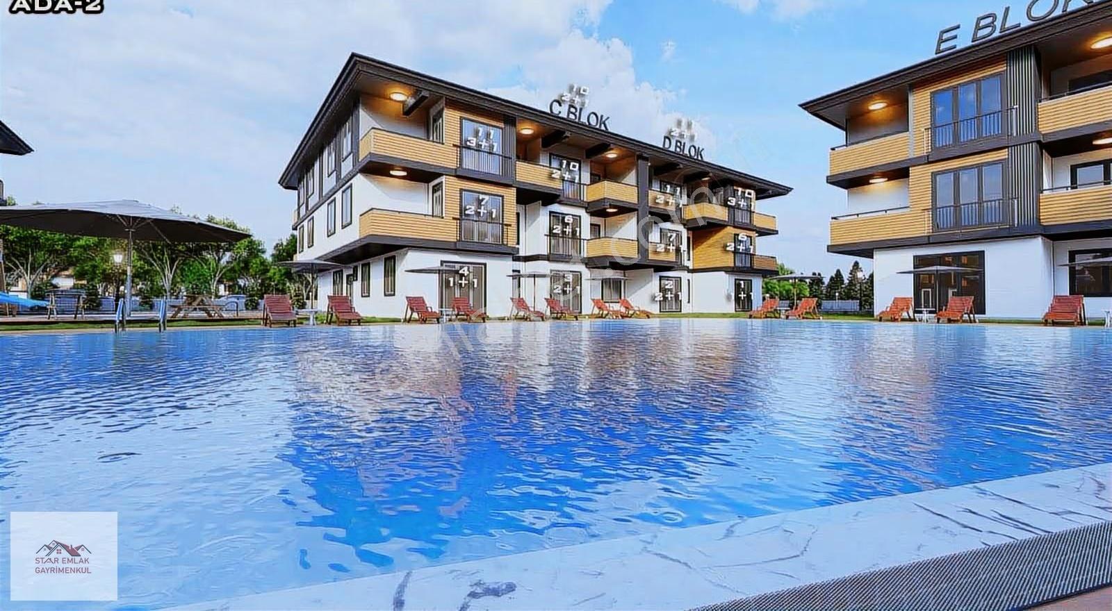 Ova Kent 2 Sitesinde Havuz Manzaralı Bahçeli 2+1 Satılık Daire