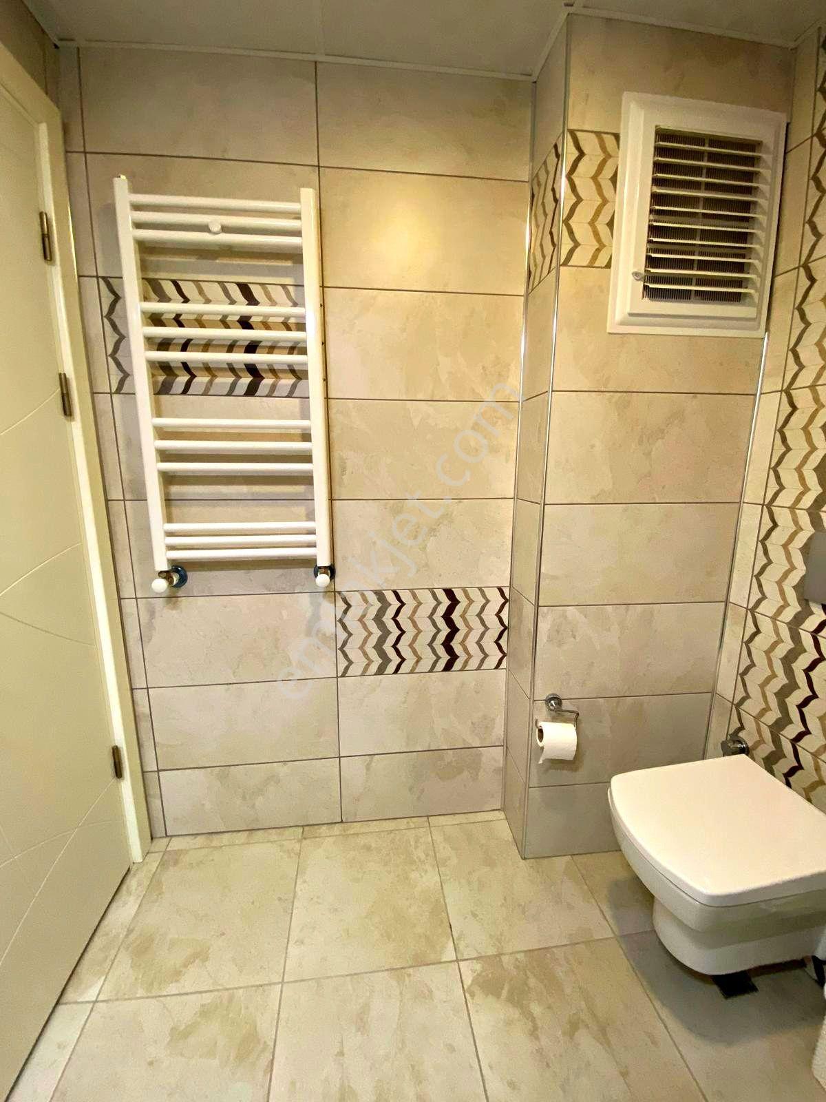 Kuşadasında Havuzlu Sitede Ful Eşyalı Doğalgazlı 2+1 Daire - Görsel 18