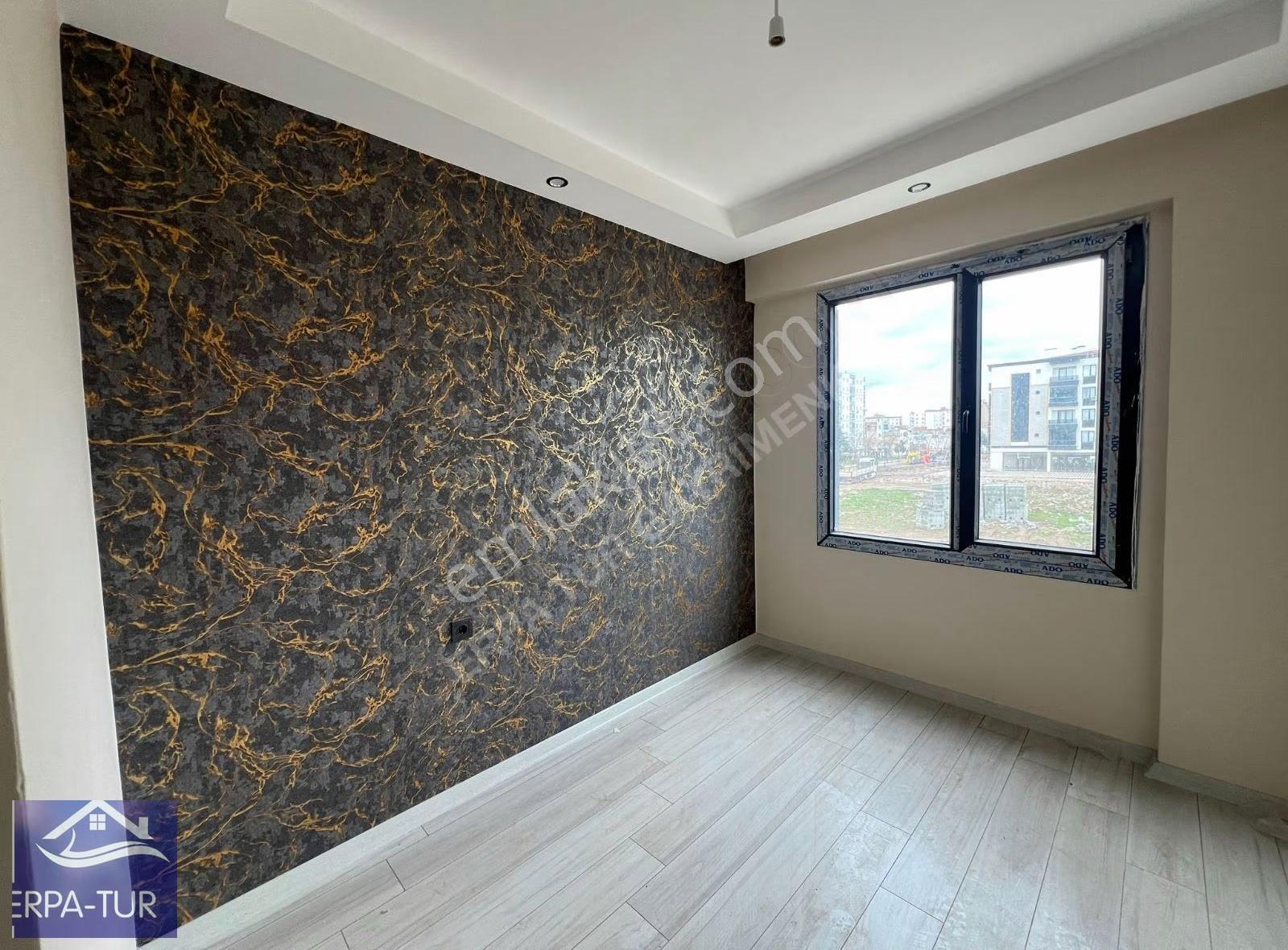 Şeyh Şamil Mahallesın'de Teraslı 1+1 Satılık Daire