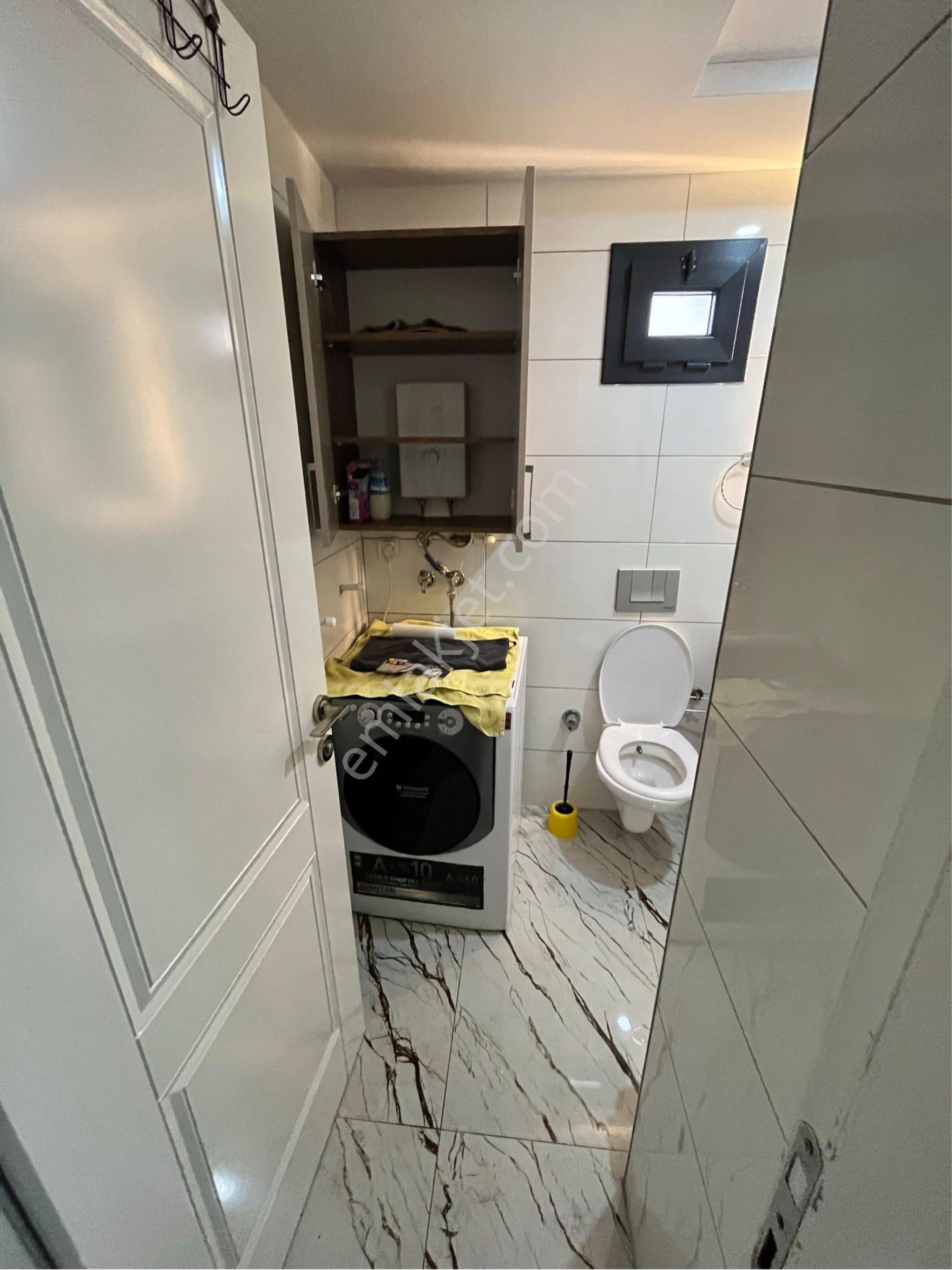 Güzelyalı’da Bahçeli 1+1 Lüks Eşyalı Kiralık Daire - Görsel 16
