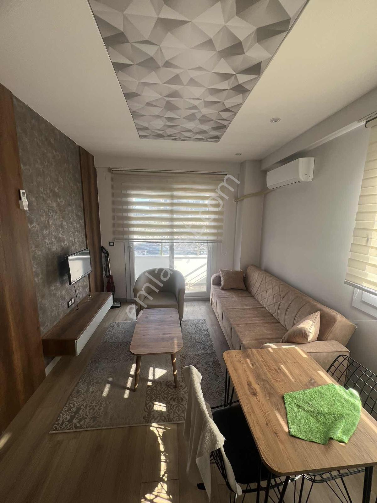 Kulepark~farkıyla~çok~geniş~45~m2net~oturumlu~1+1~eşyalı~satılık - Görsel 3