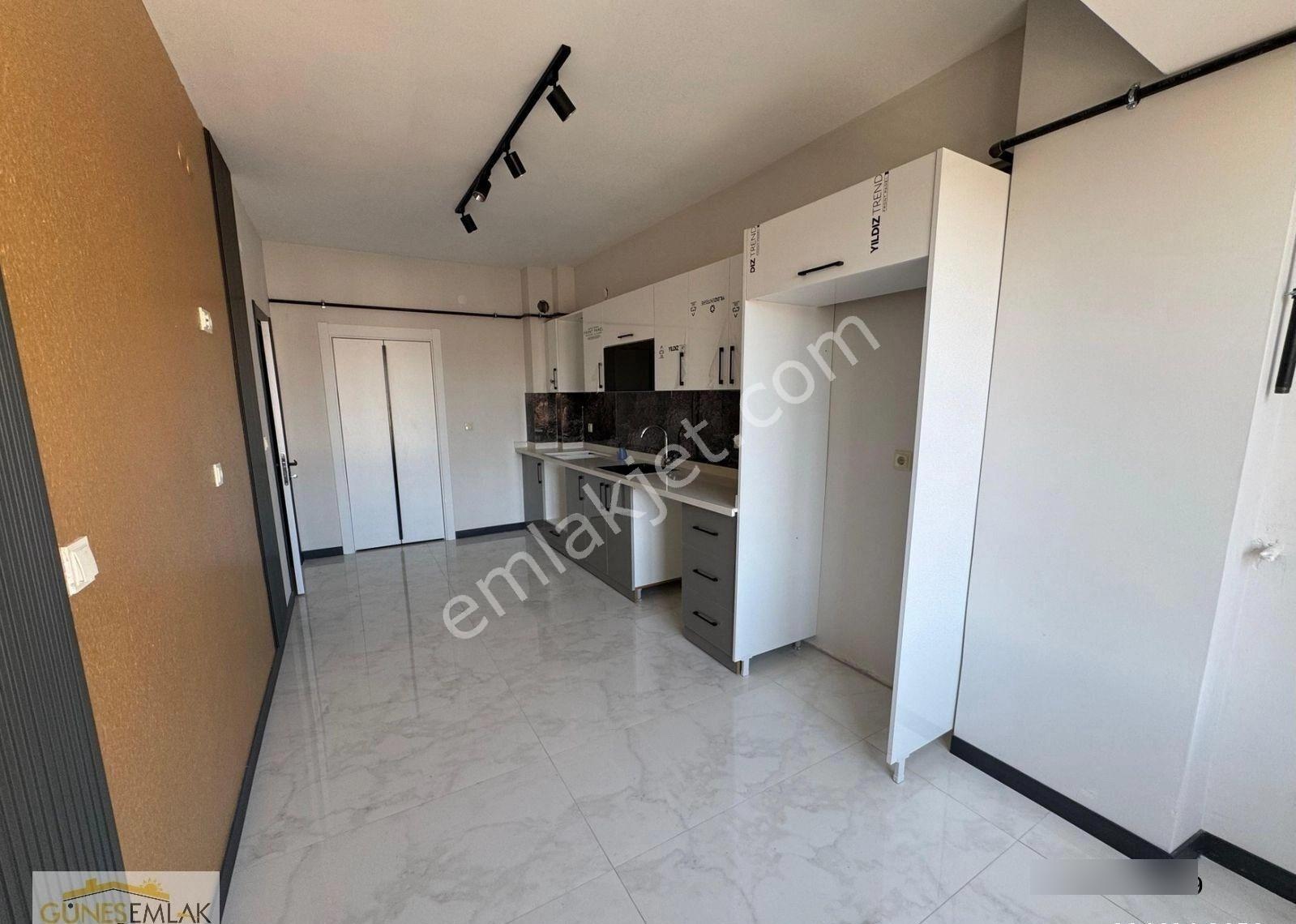 Güneş Emlaktan Cadde Üstü Satılık Sıfır Daire