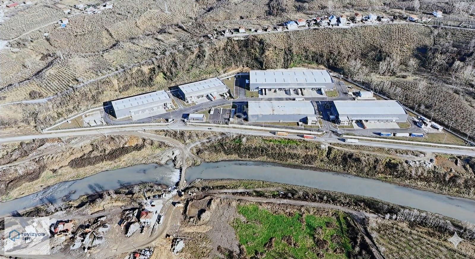 Revizyon'dan_org. Sanayi Bölg._anayola 1km**depolama Alanları**
