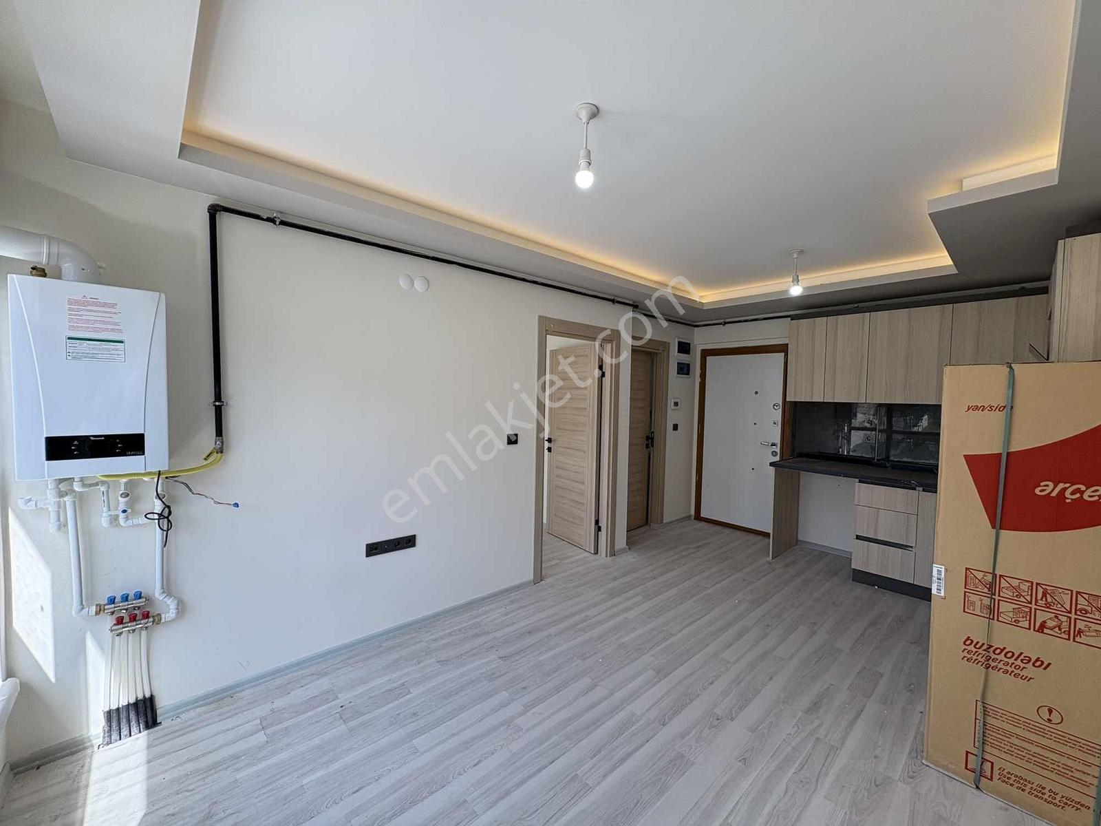 Alaçatı'dan İncek'te Ara Kat Güney Cephe Bulvar Yakını Geniş 1+1 - Görsel 5
