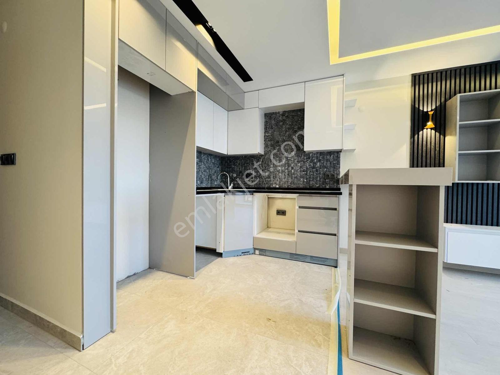 Kuşadası Davutlar'da Kendine Ait Bahçeli Satılık 2+1 Sıfır Daire - Görsel 24
