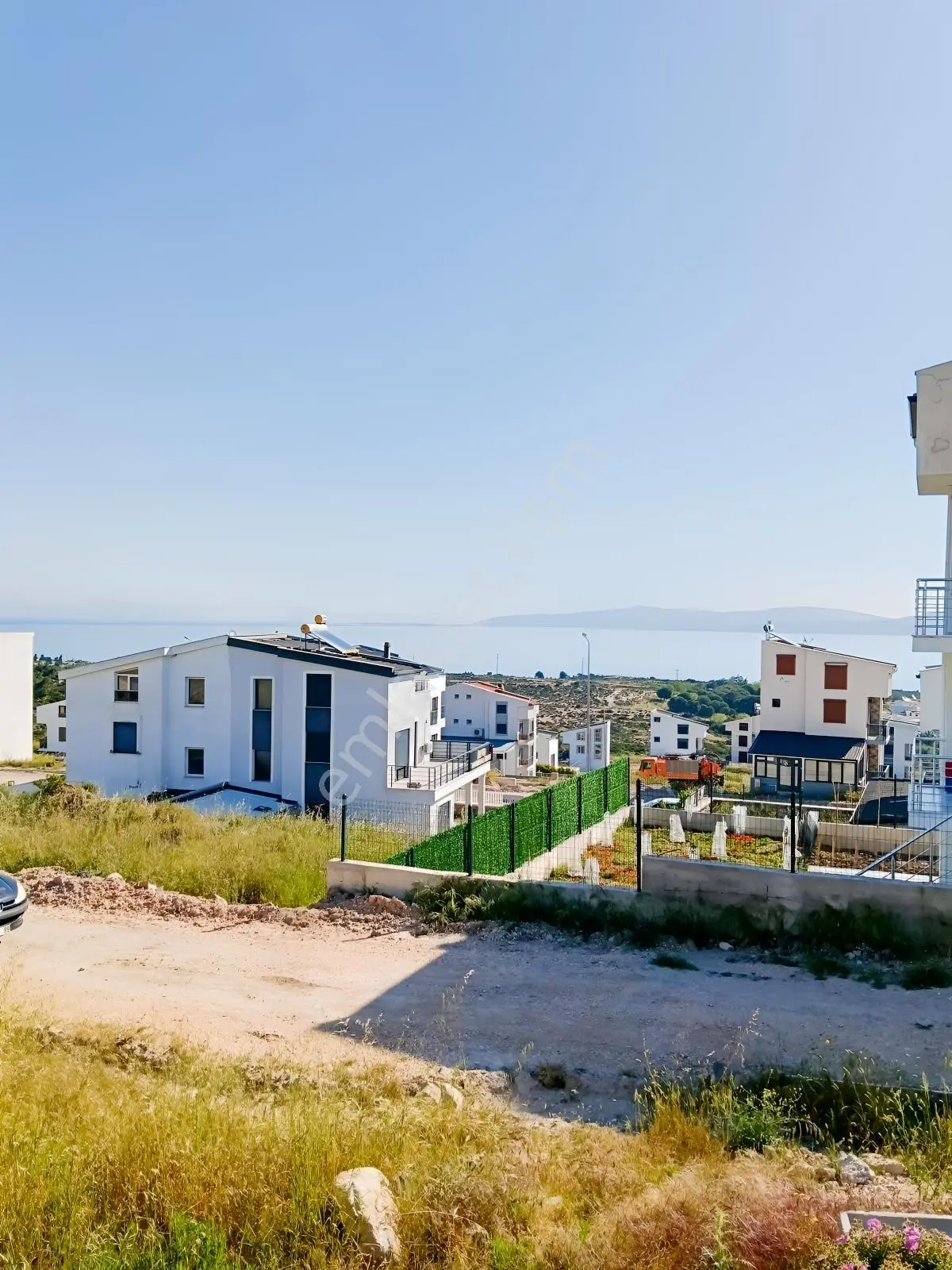 Karaburun Kamukent'te Deniz Manzaralı İmarlı Planve Projeli Arsa