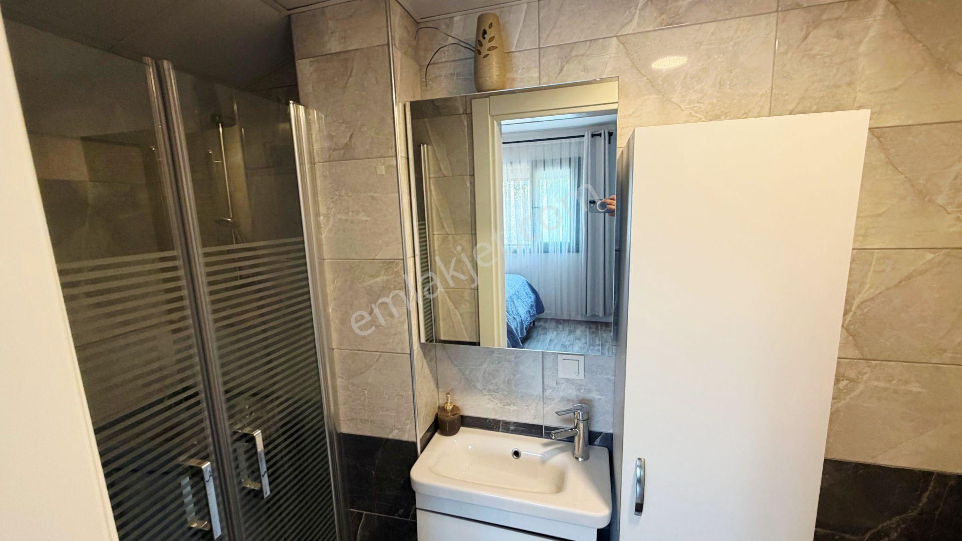 Seferihisar'da Havuzlu Sitede Satılık 4+2 Tripleks Villa - Görsel 22