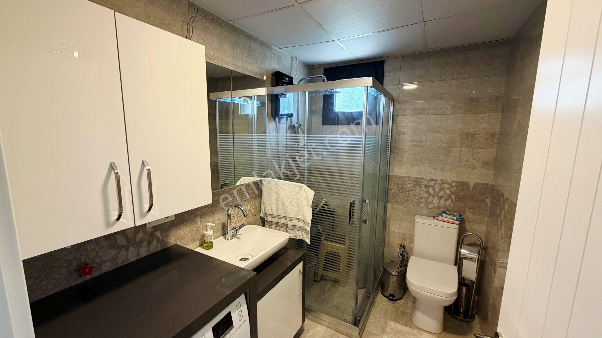 Seferihisar'da Havuzlu Sitede Satılık 4+2 Tripleks Villa - Görsel 21