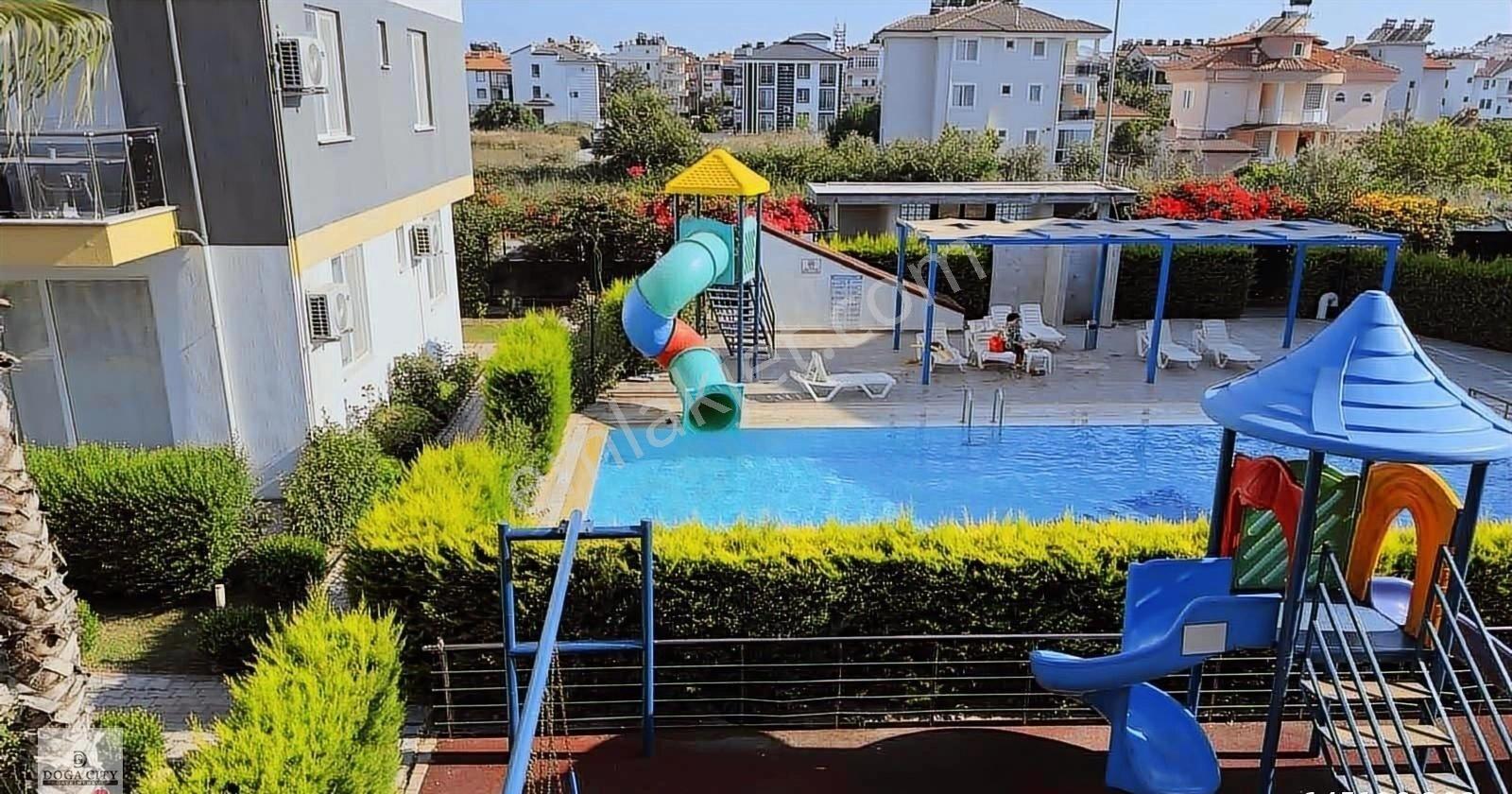 Dalaman Merkezde Çift Havuzlu Sitede 2+1 Eşyalı Kiralık Daire