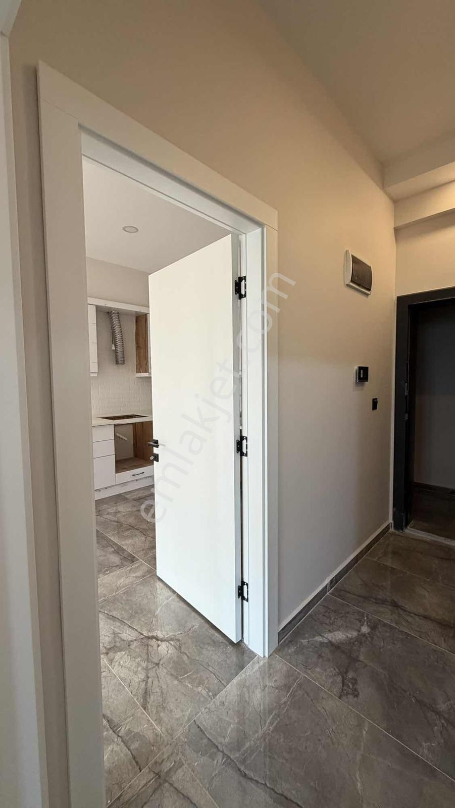 Kuşadası Güzelçamlıda Sıfır Yapım Satılık 1+1 Bahçeli Daire - Görsel 38