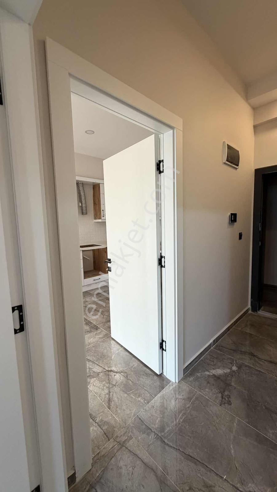 Kuşadası Güzelçamlıda Sıfır Yapım Satılık 1+1 Bahçeli Daire - Görsel 37