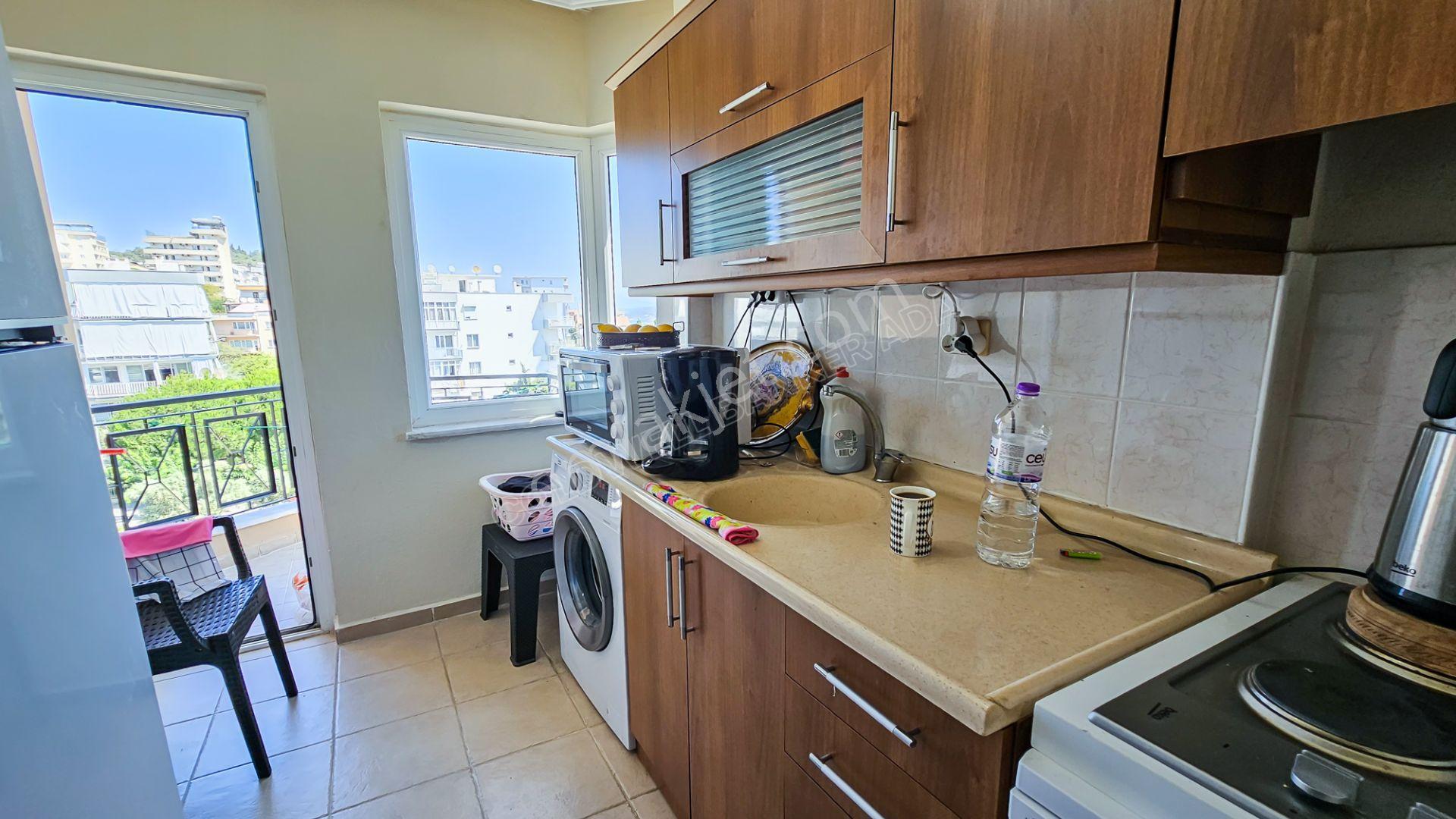 Kuşadası'nda Merkezi Konumda Ayrı Mutfaklı Satılık 1+1 Daire - Görsel 7