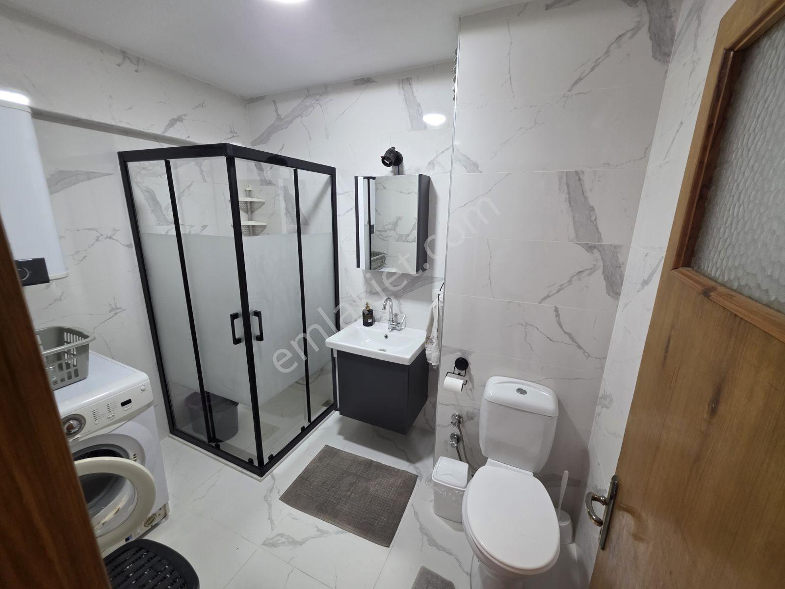 Doğanbey'de Mavi Bayraklı Denize Sıfır Tripleks 4+1 Villa - Görsel 16