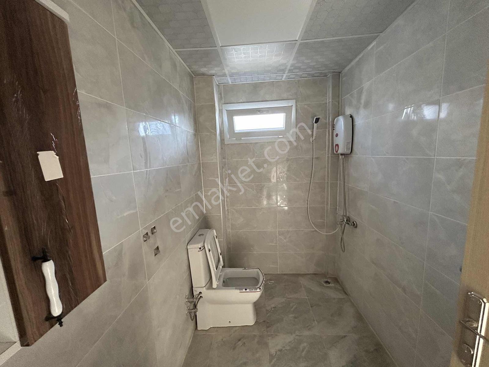 Kuşadası Davutlar'da Deniz Manzaralı Satılık 1+1 Daire - Görsel 15