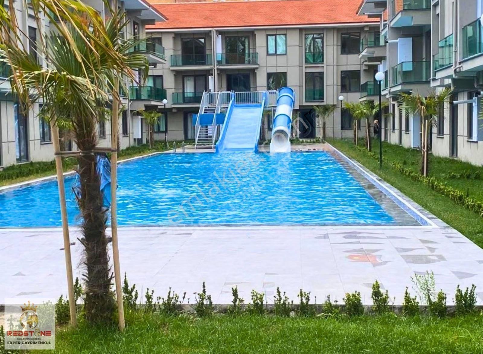 Çamlık1 Sitesinde Bahçe Kullanımlı Eşyalı 1+1 Satılık Daire