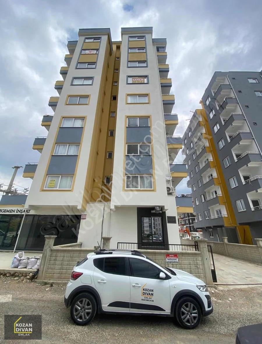 Kozan Divan Emlak'tan Üniversite Karşısında Kapalı Mutfak 3+1